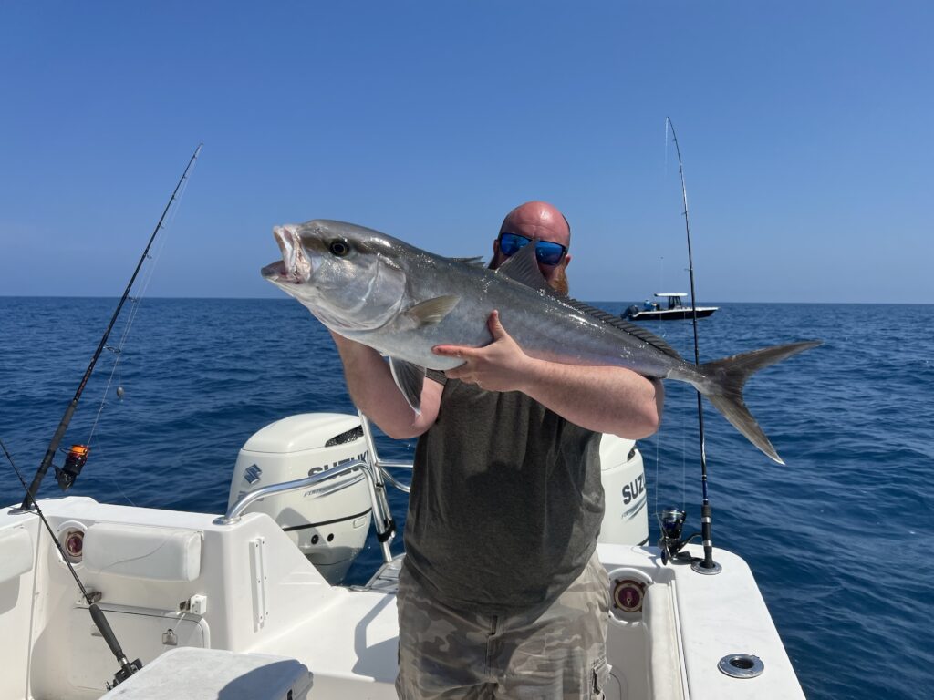Man holding a big fish | Thermocline Charters | Gulf of Mexico Offshore Deep Sea Fishing Trips | St Pete Florida