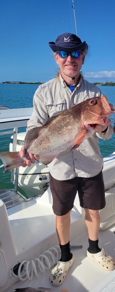 Captain Dave holding a big fish | Thermocline Fishing Charters | Gulf of Mexico Offshore Deep Sea Fishing Trips | St Pete Florida